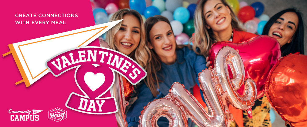 Text reads create connections with every meal. Valentine’s day. Heart icon. Group of four female students pose with pink and red balloons that say love.