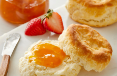 A display of a biscuit with jam.