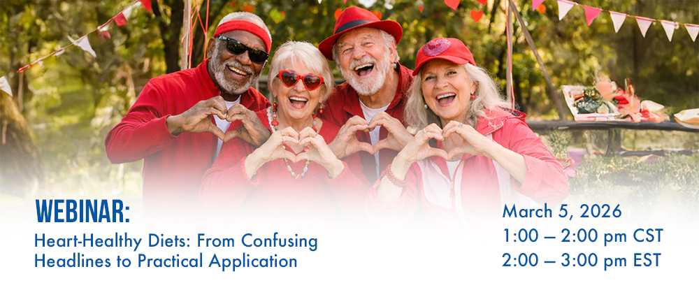 Four senior adults in an outdoor setting, smiling and creating heart shapes with their hands, promoting a webinar on heart healthy diets for senior living.