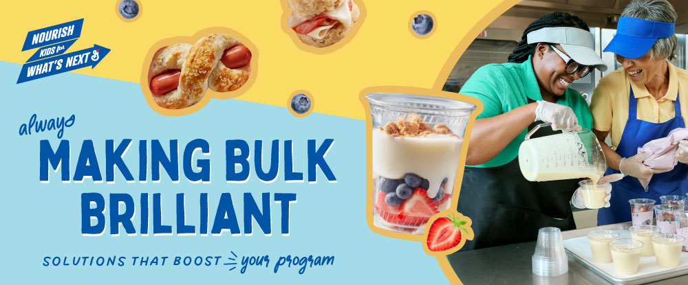Always making bulk brilliant. Solutions that boost your program. Two smiling K-12 cafeteria operators pouring yogurt into individual plastic cups on a tray.