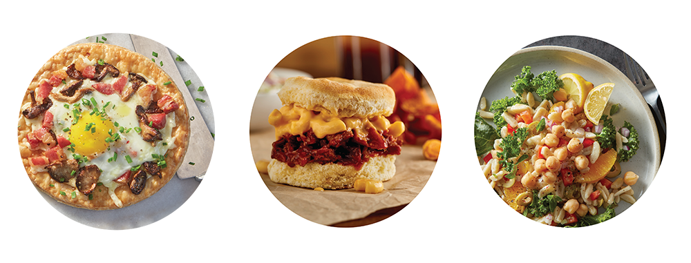 A grouping of recipes including a brunch pizza topped with an egg, a biscuit sandwich with pulled pork and macaroni and cheese, and a chickpea salad