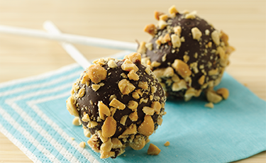 Peanut Butter Brownie Dessert Pops on light blue napkin